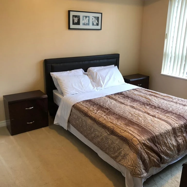 Spacious living room in furnished apartment near Square One Mississauga